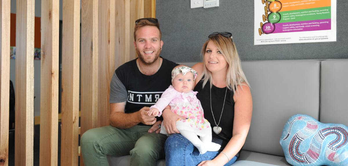 FIRST FAMILY: Horsham's Trent Johnson, Adellyn Johnson and Lisa Currie are the first family to use the Kalkee Road Children's and Community Hub services on Tuesday. Picture: DAINA OLIVER