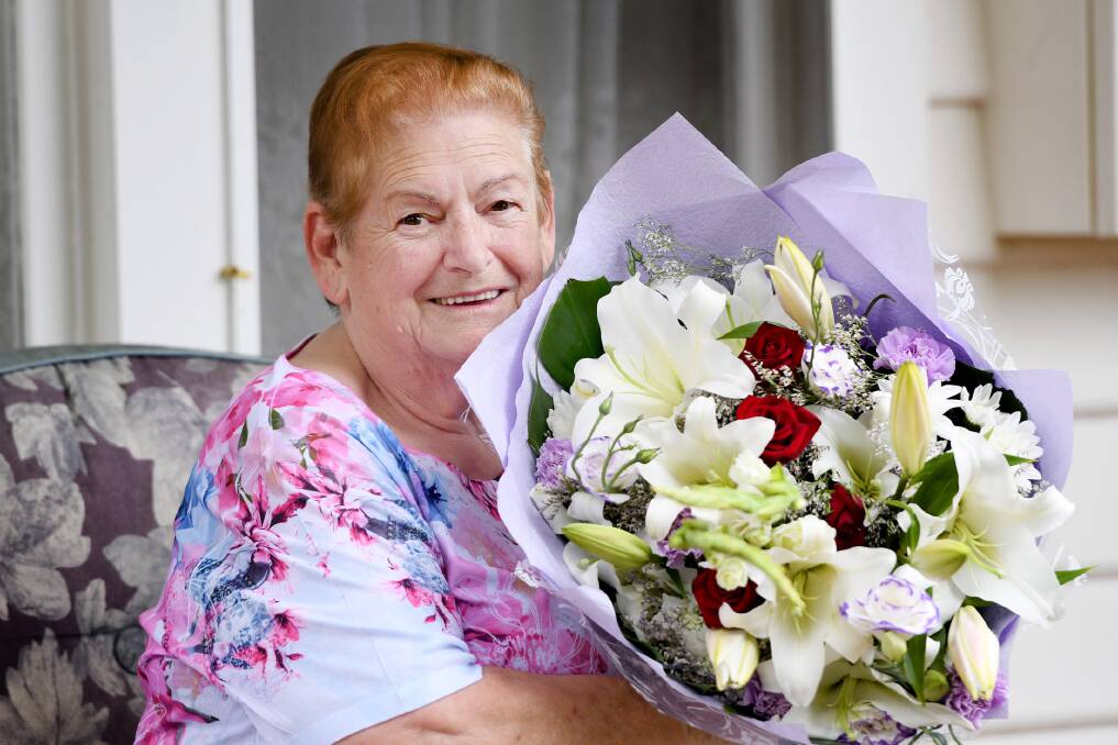 LOVING MOTHER: Horsham Florist's unsung hero for December Eleanor Arnott with the flowers she received. Picture: SAMANTHA CAMARRI