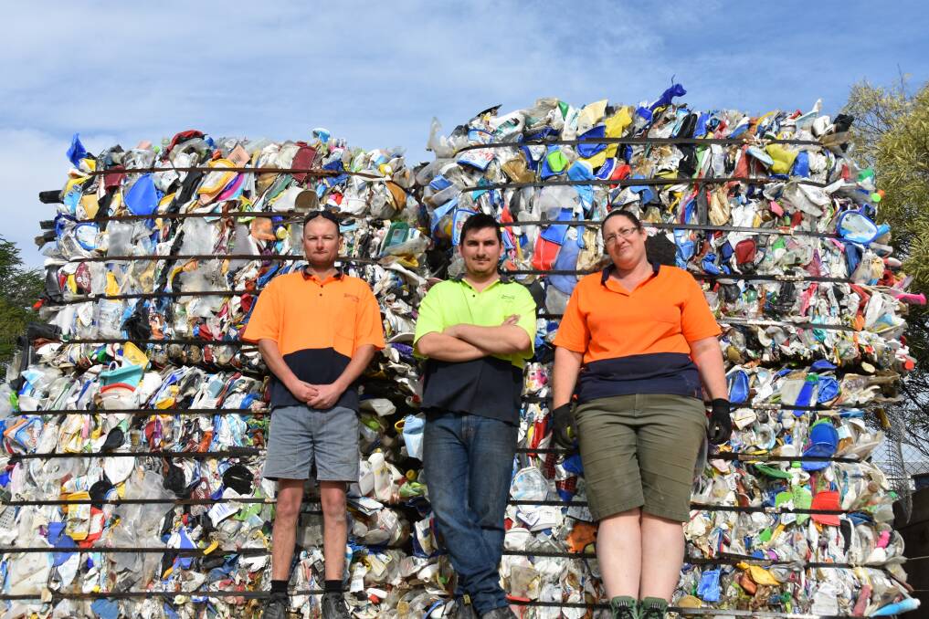 BIG PILE OF PLASTIC: Naracoorte Recycables workers Tim Rich, Dillon Prentice and Kylie Harvey with just some of the mountains of plastic that has piled up, which Wimmera Mallee Waste will now collect.