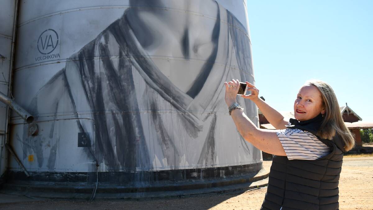 FOLLOW THE TRAIL: Melbourne's Rae Martens makes a stop at Rupanyup's silo art on her travels in the Wimmera. Picture: SAMANTHA CAMARRI