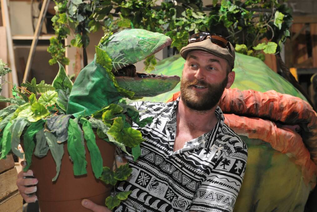 WINNER: Horsham Arts Council's Beau Ladlow with a Audrey II puppet created by himself and Milly Henley. Picture: SEAN WALES