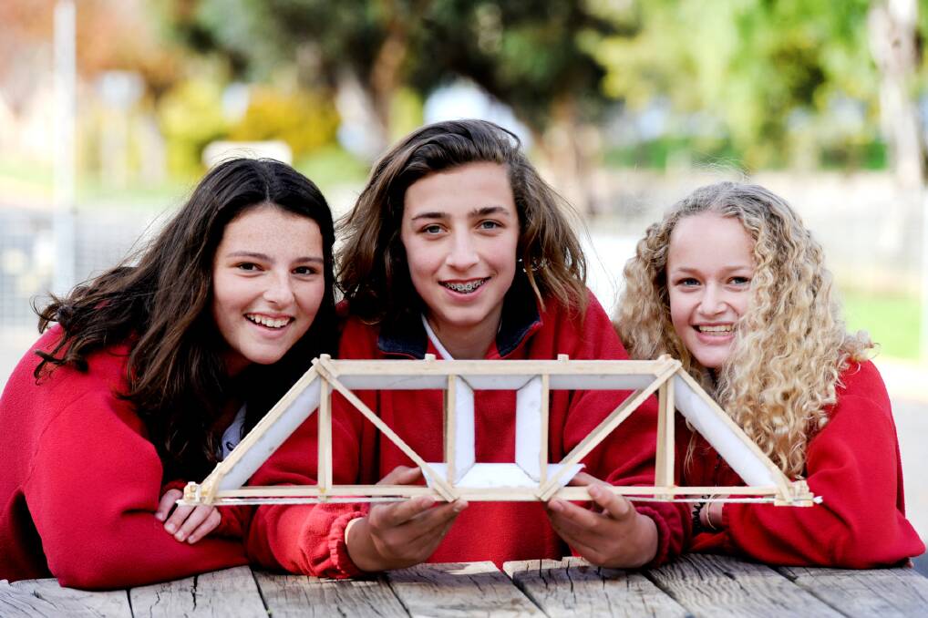 BUILD: Kaniva College year nine students Pippa Munn, Jeremey Pearson and Gabby Hodges, make up this year's bridge building team. Picture: SAMANTHA CAMARRI.