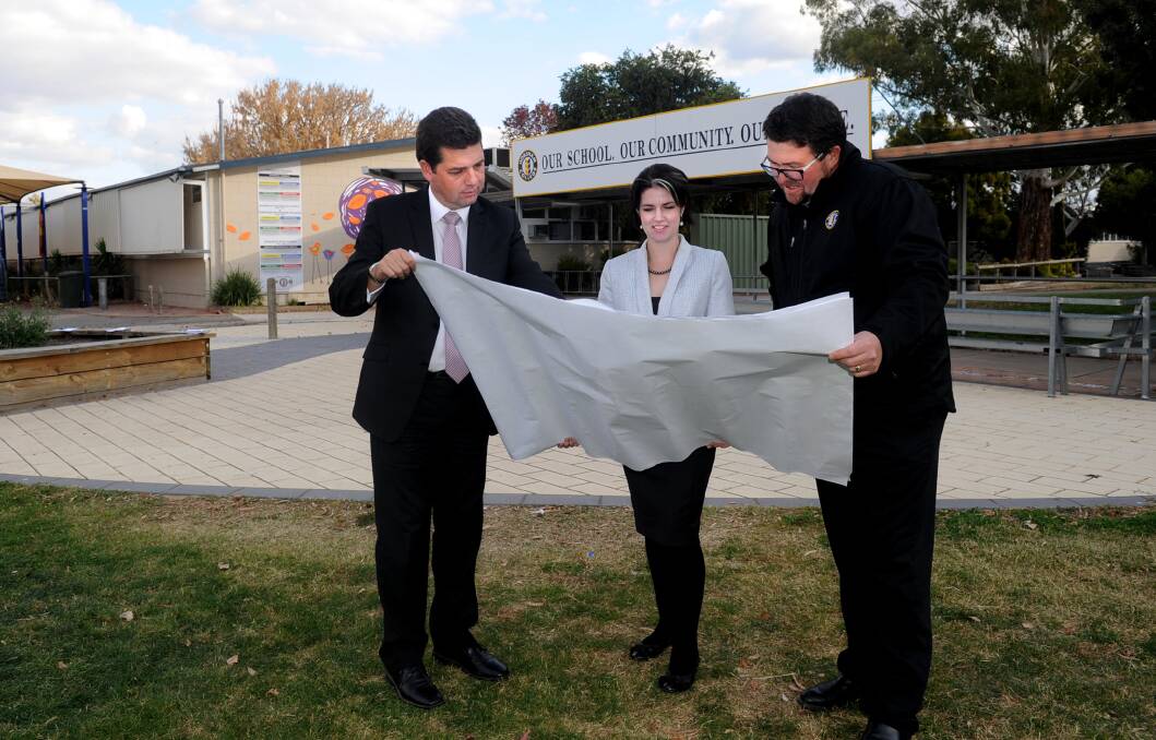 FINALIST: Horsham College principal Robert Pyers pictured with the school's redevelopment plans in 2015. Picture: SAMANTHA CAMARRI