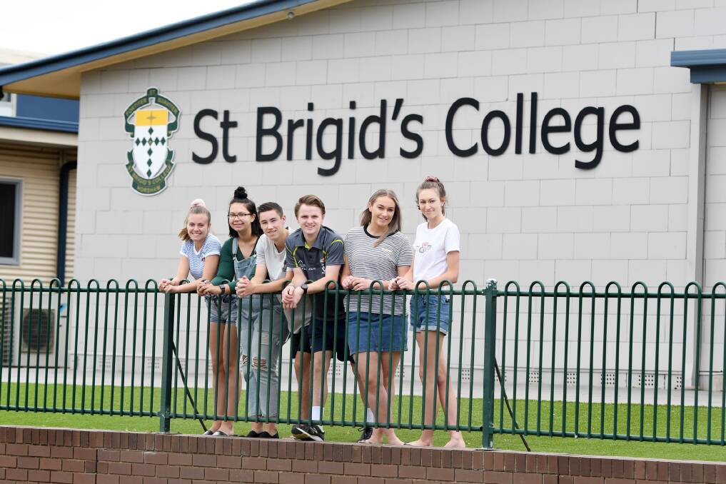 OVER AND OUT: St Brigid's College year 12 students Jess Pretorious, Danae McDonald, Alex Goldsmith, Seb Dalgleish, Abby Nagorcka, and Emma Robertson finished their final exams. Picture: SAMANTHA CAMARRI