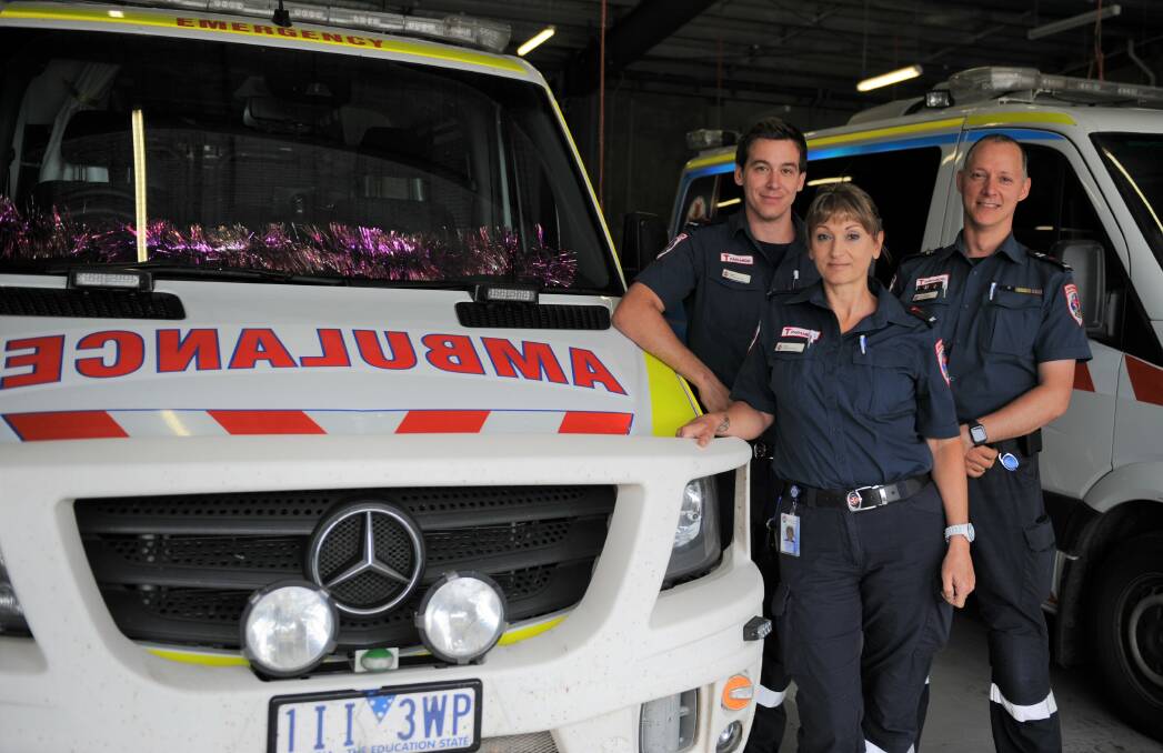 ON THE CLOCK FOR CHRISTMAS: Ambulance Victoria's paramedics Jack Dempsey and Kym Jacobs and Horsham's senior team manager Paul Burton have worked many Christmas Days over their careers as paramedics. Picture: DAINA OLIVER