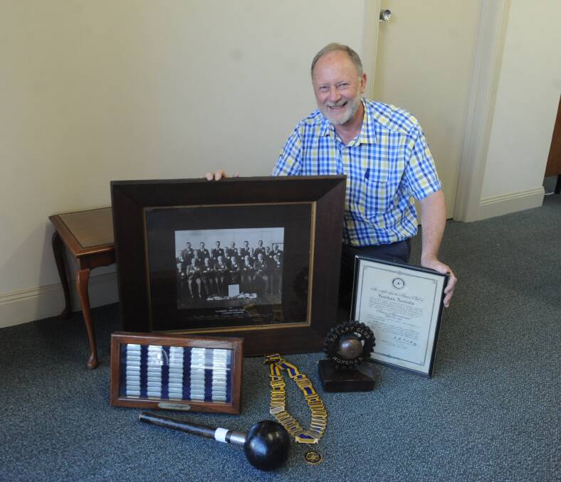 BACK IN TIME: Horsham Rotary Club president Graham Gerlach with memorabilia from the Rotary club's first charter formed in 1928. Picture: DAINA OLIVER