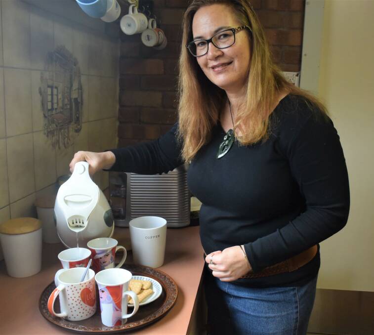 ACT OF KINDNESS: Centre for Participation's Stephanie Thomson volunteers to make a cup of coffee for everyone in the office for her good deed on 'do something day'. Picture: DAINA OLIVER