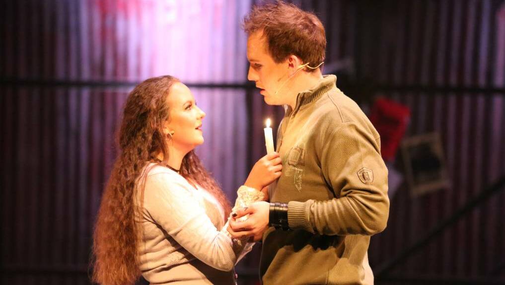 LIGHT MY CANDLE: Erin Boutcher, who plays Mimi, and Brady King, who plays Roger, sing together in the Horsham Arts Council's production of Rent. Picture: AMANDA WILSON