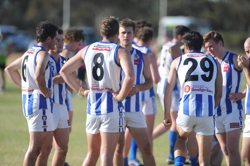 Southern Roos players huddle during the Jeparit-Rainbow clash. 