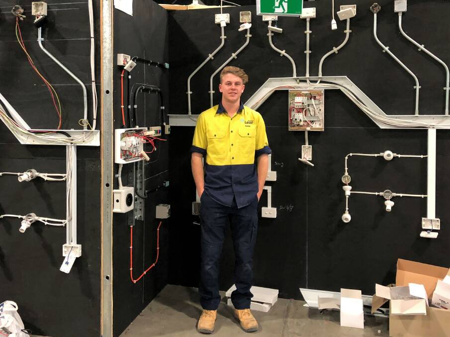 Corey Mann in front of his station at the WorldSkills National Championships. 