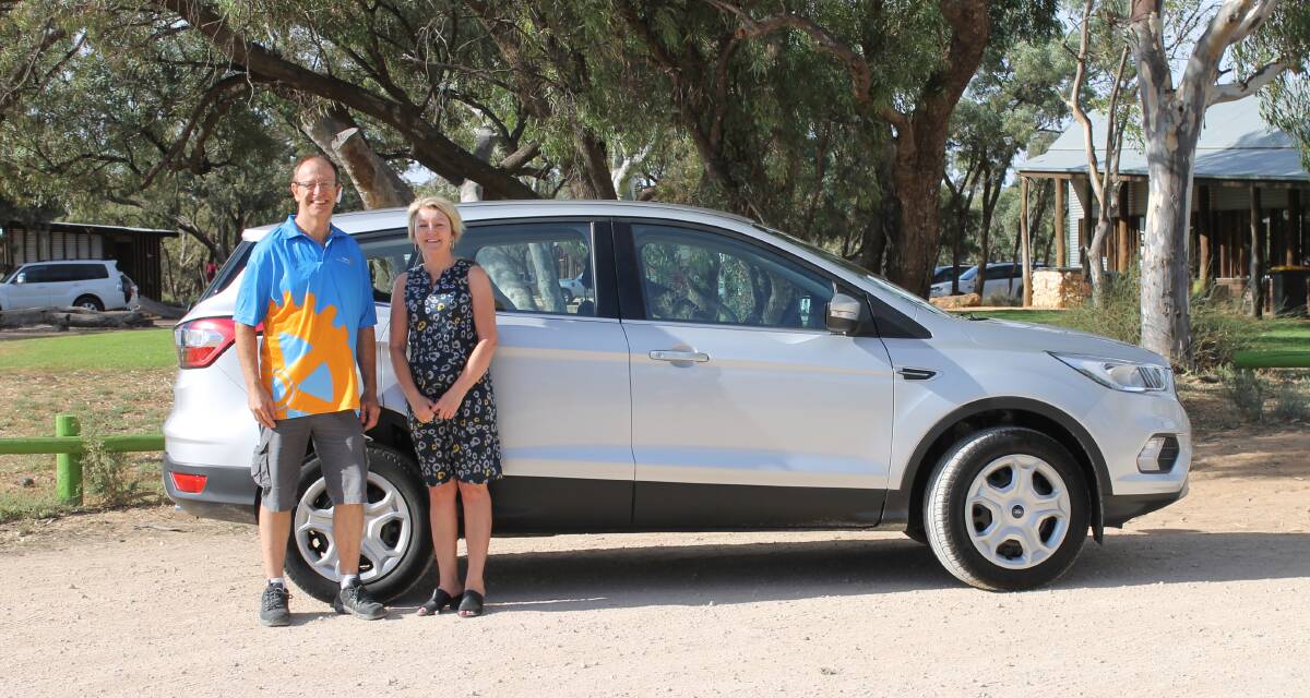 HAPPY: Horsham East Rotary Club raffle co-ordinator Zane Bell with delighted car  winner Anne Robertson, of Hopetoun. Picture: CONTRIBUTED 