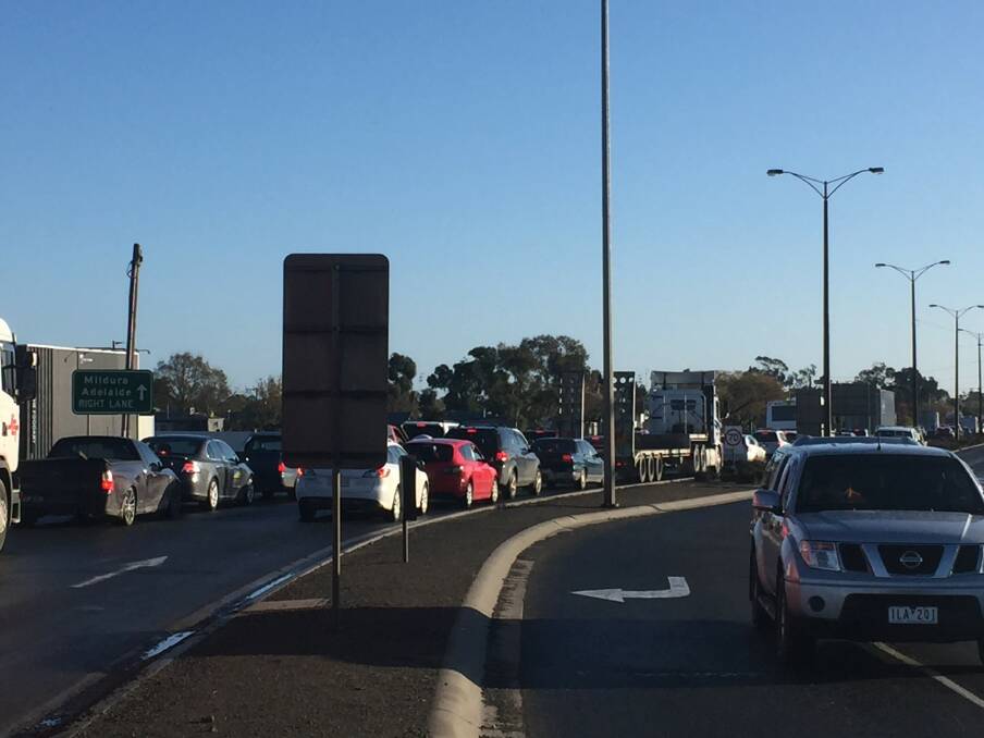 Traffic banked up to the Stawell Road Caltex on Monday morning.