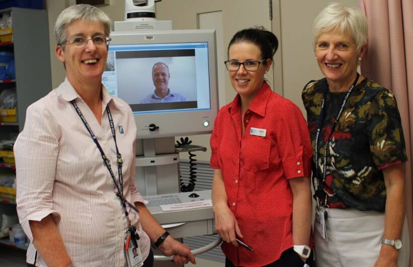 NEW TECHNOLOGY: Bernadette Ryan, Brooke Walsh and Janette McCabe use the telemedicine equipment while talking to Christopher Baldin. Picture: CONTRIBUTED