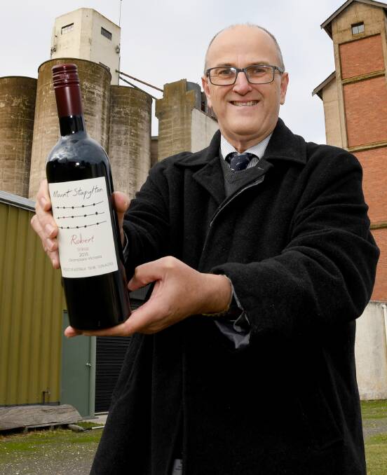 PERFECTIONIST: Mount Stapylton Wines wine maker Don McRae holding the 'Robert' 2015 Shiraz vintage. Picture: SAMANTHA CAMARRI
