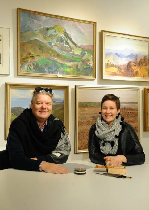 CHANCE: Horsham Regional Art Gallery director Adam Harding and gallery education officer Faith Hardman in front of the inspiration wall for Lager and Landscapes.