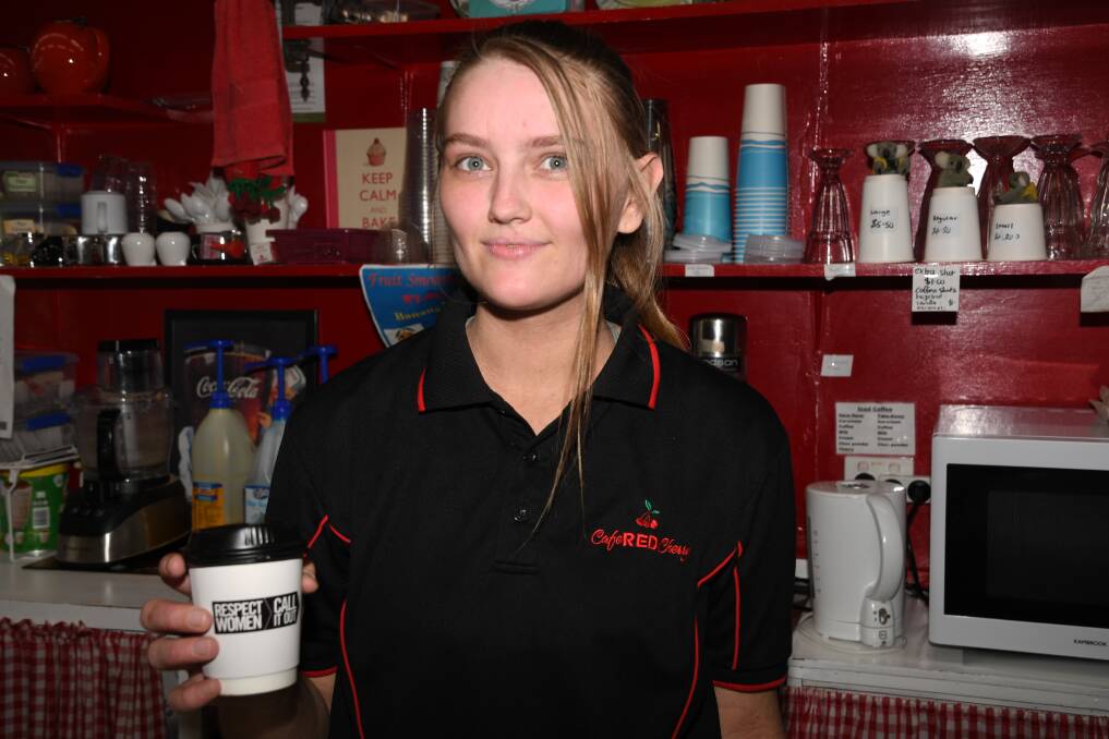 CALL IT OUT: Cafe Red Cherry barista Alanah Saunders with one of the campaign cups. Picture: ELIZA BERLAGE