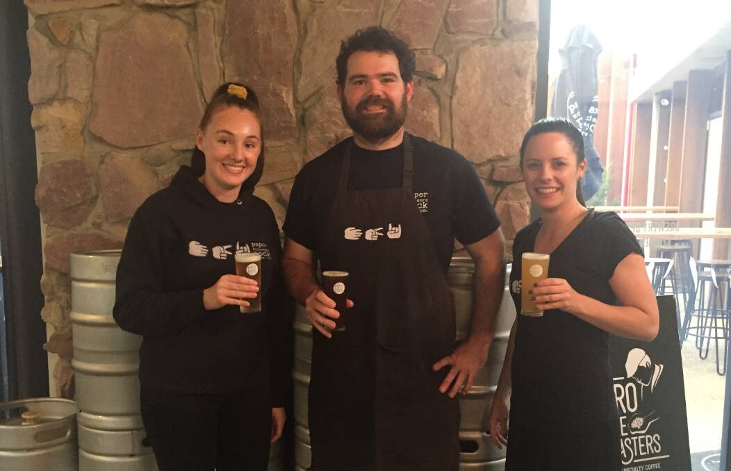 BUSY BREWERY: Paper Rock Scissors Brew Co staff Daisy Walker who works on the bar, chef Nick Shelley and manager Carlee Vokes. Picture: JESSIEANNE GARTLAN