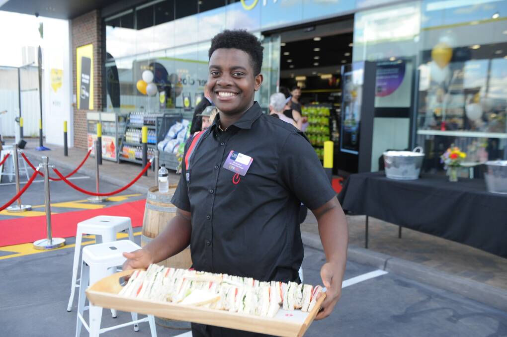 NEW JOB: On The Run employee Naf Niyukuri of Horsham was handing out sandwiches at the launch event on Wednesday evening. 