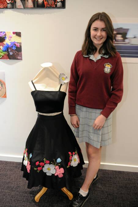 St Brigid's College textiles student Kira Guest with her Cream of the Crop embroided dress