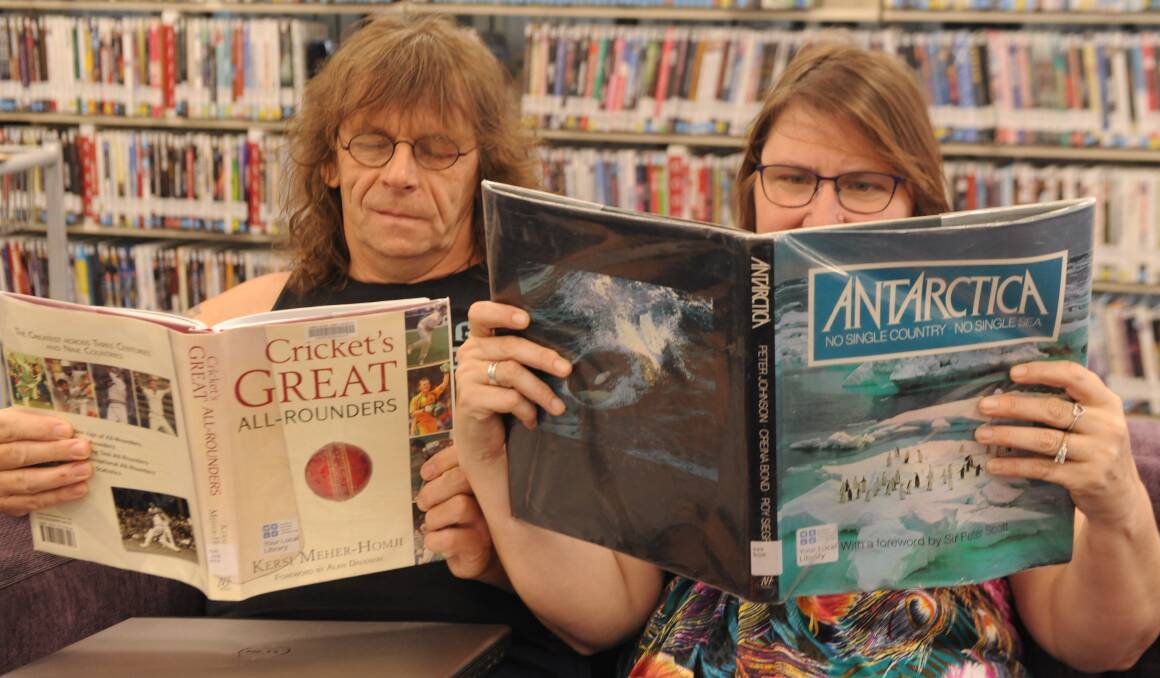 WELL READ: Karl Barker and Gayle Manawaring of Horsham said they regularly visited Horsham library to borrow books, DVDs and CDs as well as to utilise the free wifi. Picture: ELIZA BERLAGE