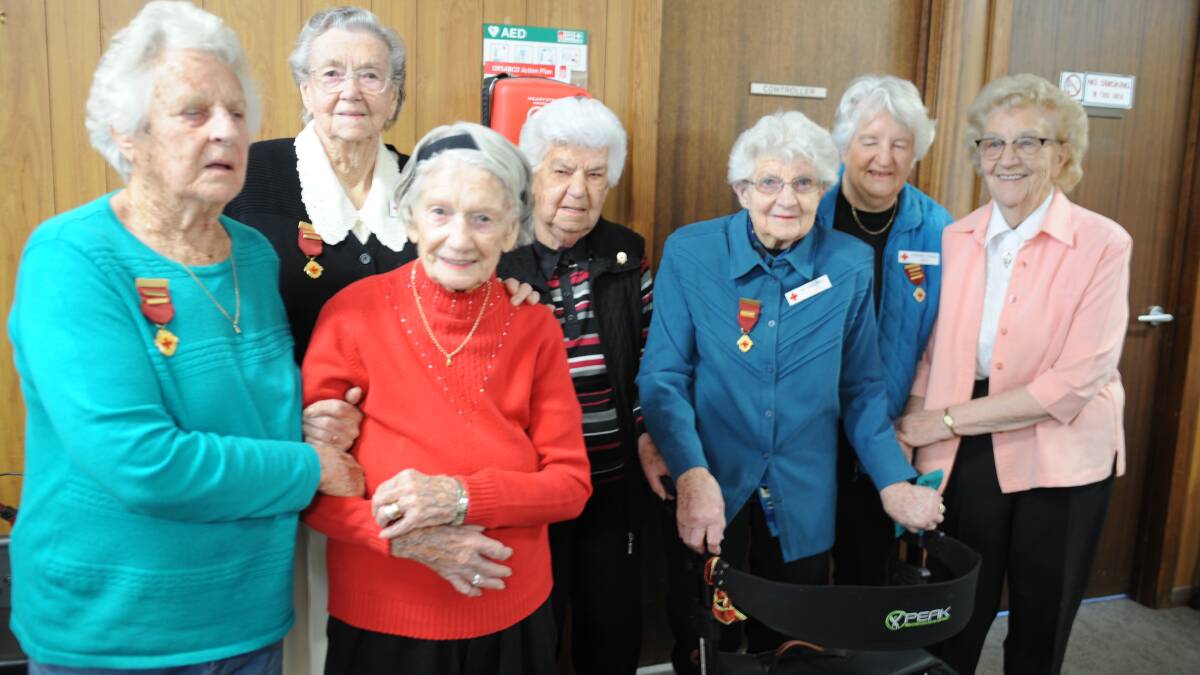 DEDICATED: Betty Nattrass, Barbara Ellifson, Claire McKenry, Doris Guest, Margaret Maher, Ronda Morris and Marj Smith have received long-service accolades with the Red Cross. Picture: ELIZA BERLAGE