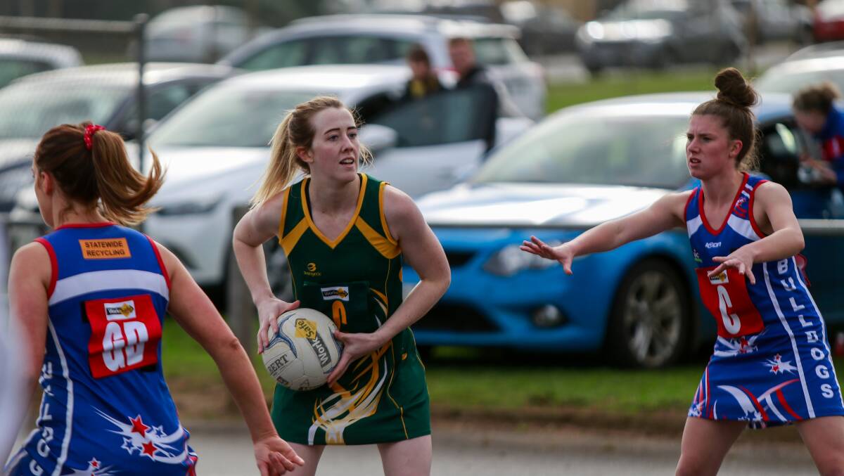 Crowd: Spectators watch on as Old Collegians centre Rachel Alderson looks for options in a game against Panmure in 2019. Picture: Anthony Brady