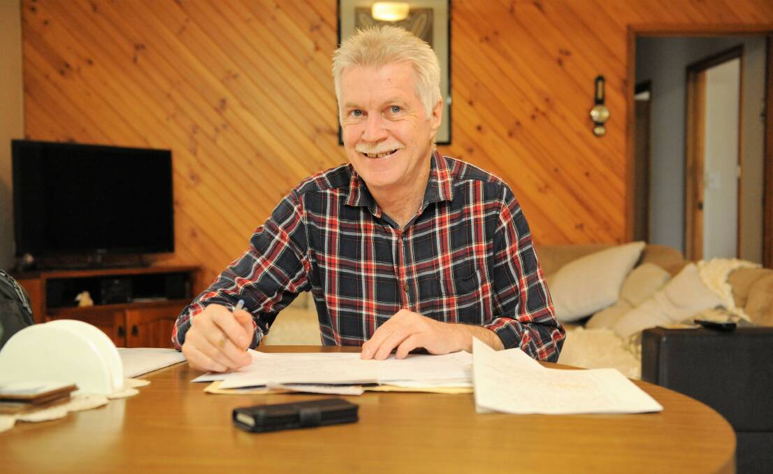 Barry Shea reads through documents at his Horsham home as he prepares to stake a claim for the Lowan leadership in November. Picture: CARLY WERNER