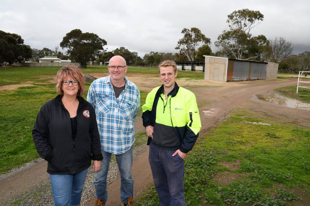 NEW NAME: Horsham Agricultural Society secretary Andrea Cross, committee member Daryl Wallace and junior vice-president Zack Currie stand in Maydale Reserve. Picture: SAMANTHA CAMARRI