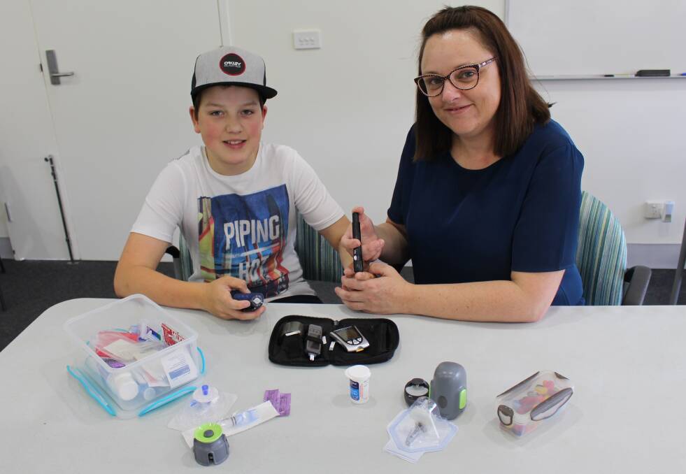 PEACE OF MIND: Cooper Rosevear and his mum Vicki Hughes use insulin pump therapy and continuous glucose monitoring to help control Cooper's type 1 diabetes. Picture: CONTRIBUTED