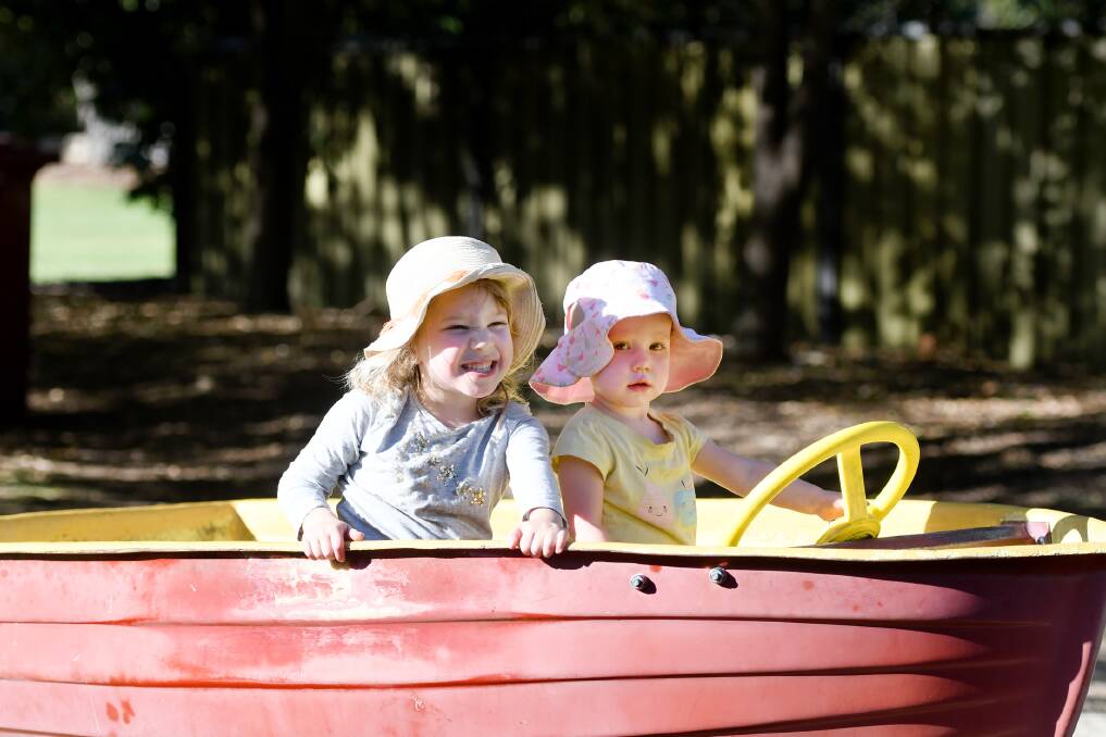 Horsham sisters Isabelle Ross, 4, and Ette Ross, 2, enjoy some time in the sun at Horsham Botanic Gardens on Friday. Picture: SAMANTHA CAMARRI