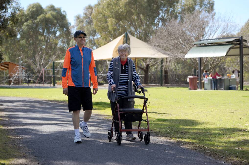 Rene Vivian and her son Simon walk in the 2016 Walk in the Park for Parkinson's. Picture: SAMANTHA CAMARRI
