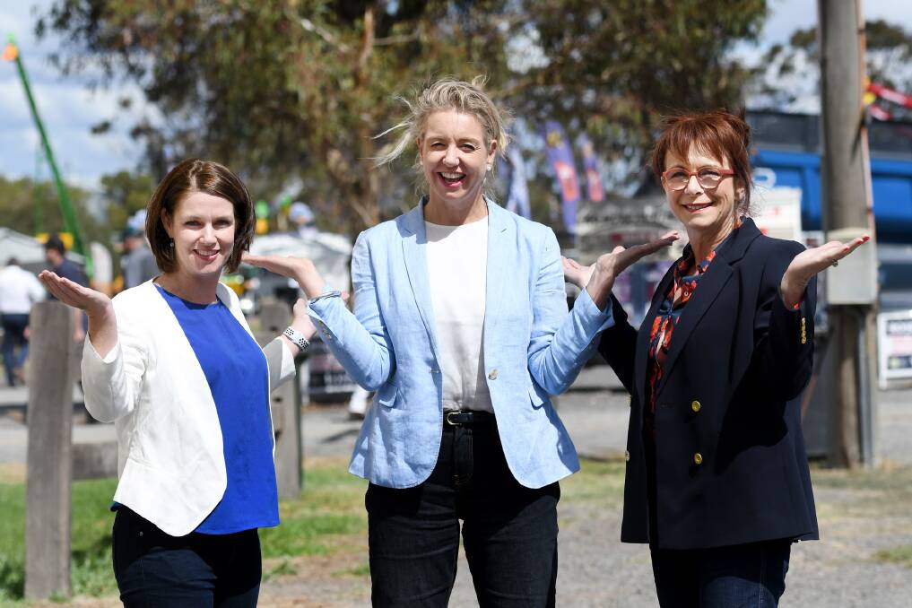 Member for Lowan Emma Kealy, Nationals deputy leader Bridget McKenzie and Nationals candidate for Mallee Anne Webster display the #BalanceforBetter theme for International Women's Day. Picture: SAMANTHA CAMARRI