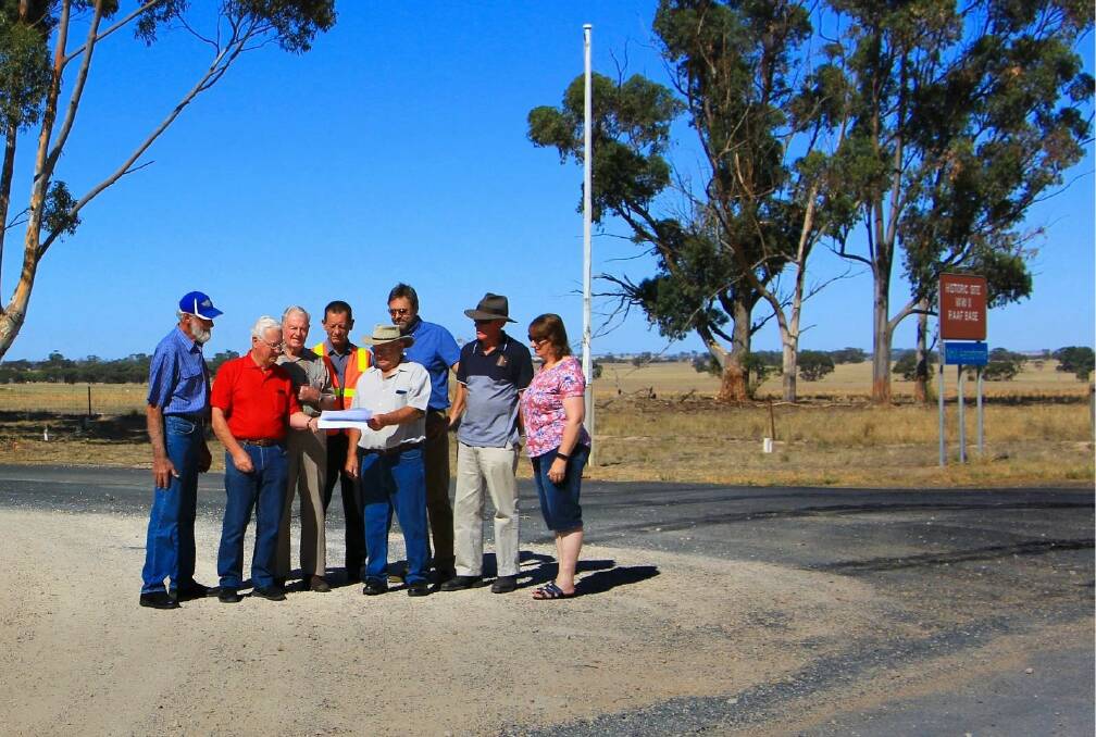Hindmarsh Shire Council and Nhill Aviation Heritage Centre representatives look over plans for a new memorial. Pictured from left are Len Creek, John Deckert, Merv Schneider, Garry Salt, Don Munro, Jeff Woodward, Rob Lynch and Jennifer Goldsworthy. Picture: CONTRIBUTED