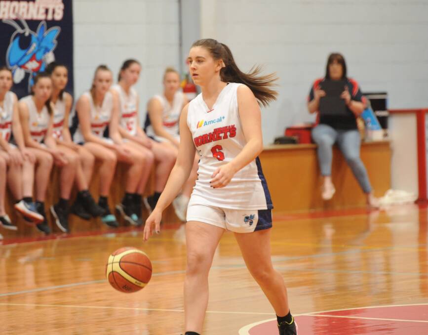 STEPPING UP: Georgie Carberry, pictured playing against Terang earlier this season, contributed 20 points for Lady Hornets on Saturday night. Picture: SEAN WALES
