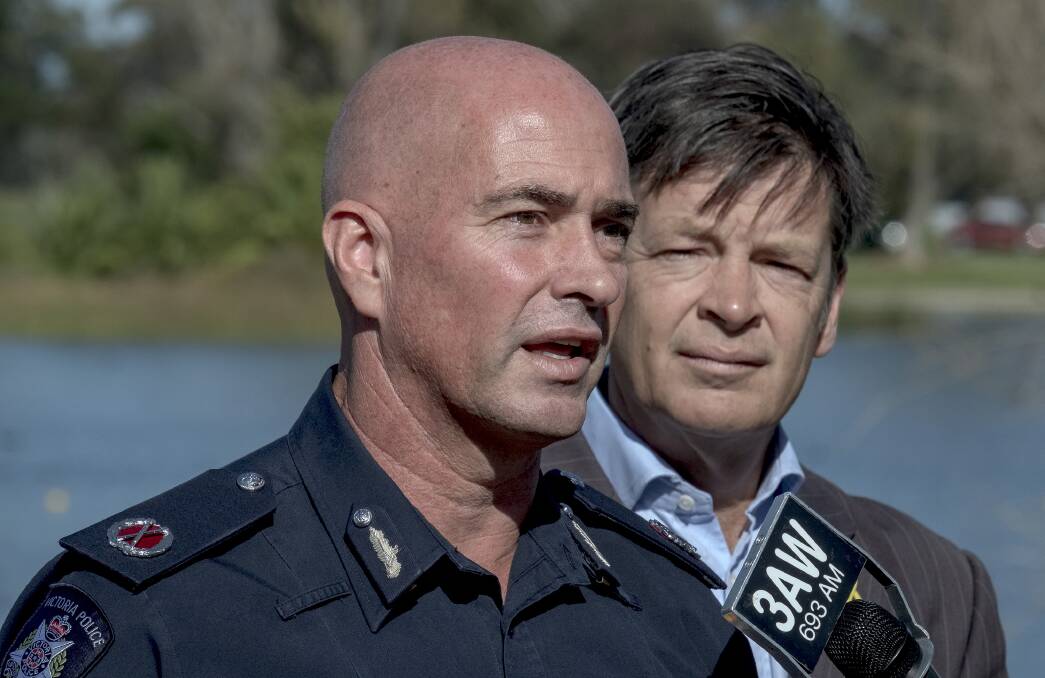 Assistant Commissioner Doug Fryer, with Roads Minister Luke Donnellan, speaks about the crash that killed four people. Picture: Luis Enrique Ascui