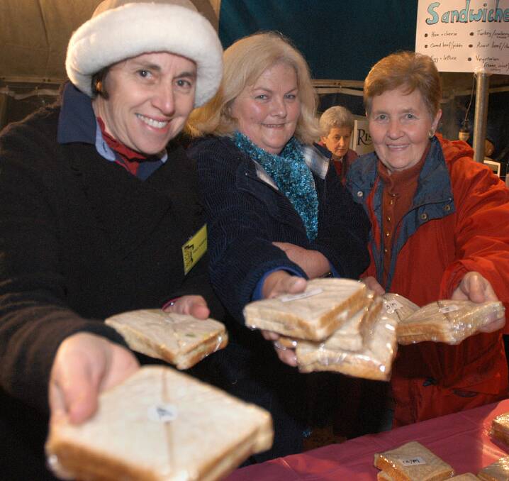 Janice Sudholz, Sandra Hateley and Jean Combe (Nati Aged Care WWHS volenteers) selling sangas at the concert 