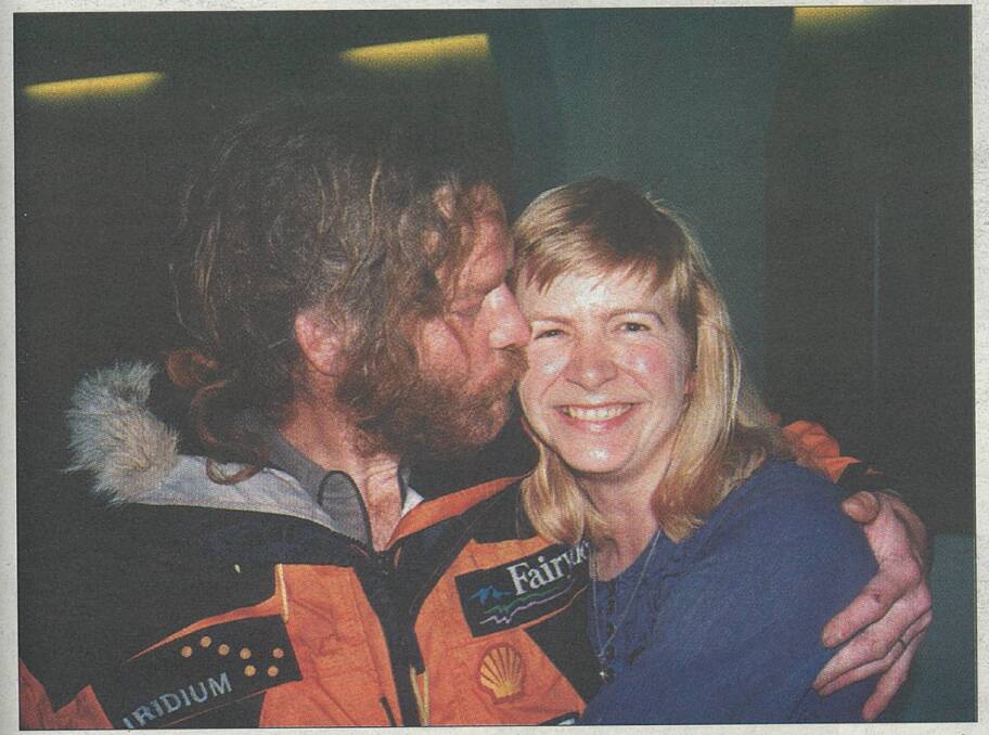 TOGETHER AGAIN: Brigitte Muir, right, greets her husband Jon at Christchurch Airport immediately after his arrival from Antarctica. 