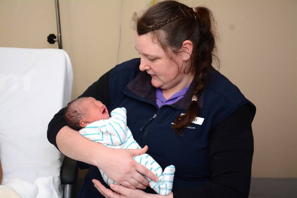 Aged care nurse Bronwyn McIntyre with baby Arshika “Rose” Shahi. Picture: CONTRIBUTED