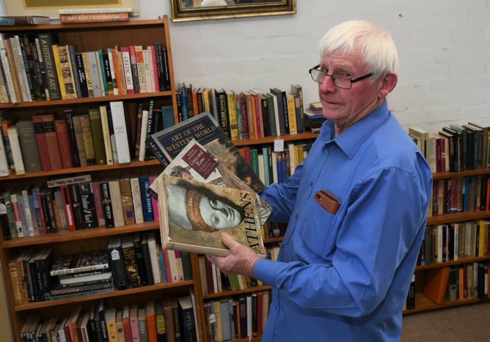 GENEROSITY: Minyip Progress Association member Keith Daniells at Saddler's Second Chance with some of Dr Homer Rieth's book collection. Dr Reith donated his library to the association to help raise funds for a new fuel station for Minyip. Picture: JADE BATE