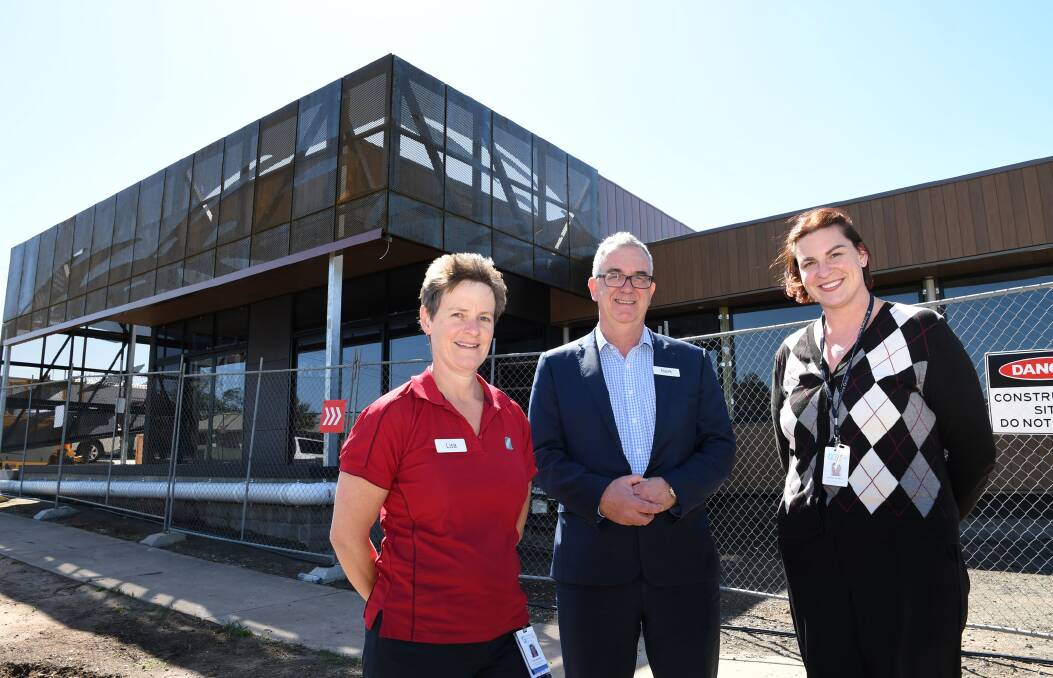 DONORS THANKED: Day Oncology Acute Nursing Unit manager Lisa Maroske, acting chief executive Mark Knights and Amelia Crafter, at the new Cancer Centre building. Picture: SAMANTHA CAMARRI