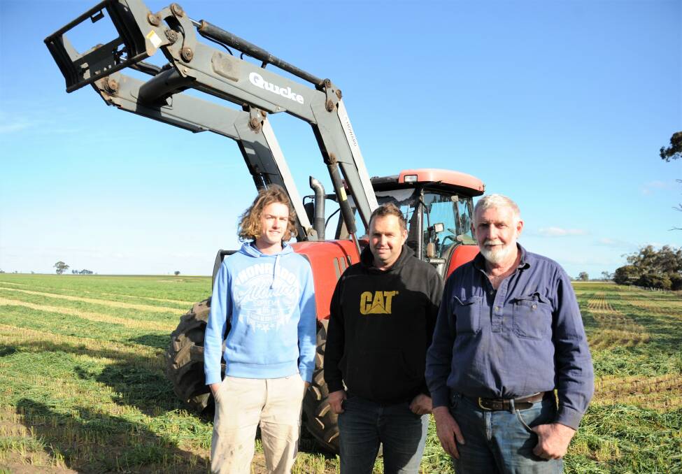 HAY TIME: Natimuk farmer Brian Klowss (middle) with son Liam and Balmoral's Keith Parry from Green and Gold Hay Contractors. Keith was cutting hay at Brian's property. Picture: JADE BATE
