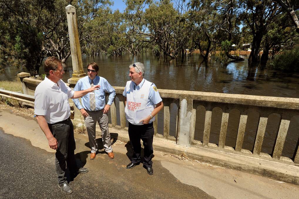 Ray Campling (centre) during the 2011 floods.