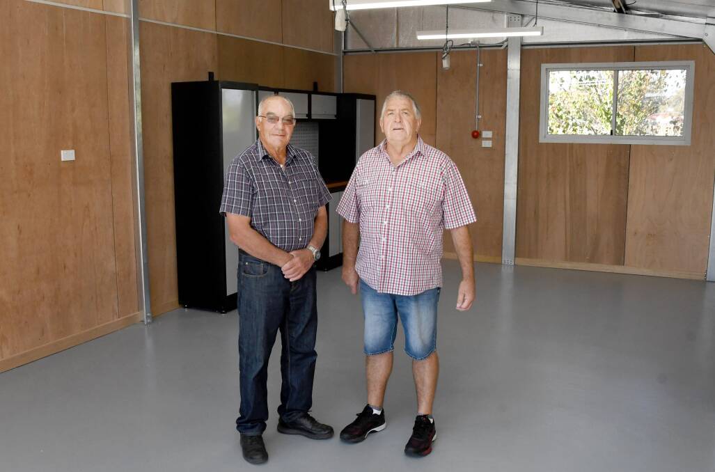 NEW FACILITY: Wimmera Lodge Retirement Village residents Ian Baker and John Mulquiny in their new workshop shed. Picture: SAMANTHA CAMARRI