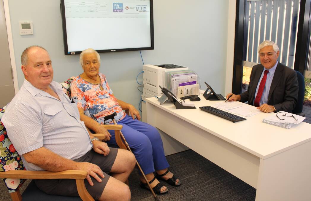 FIRST CLIENTS: Prof George Kannourakis greeted his first patients at the new Wimmera Cancer Centre on Wednesday morning, John and Audrey Klemm. Picture: CONTRIBUTED