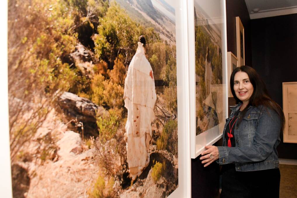 VOICES HEARD: Gail Harradine with her pieces on display in the Horsham Regional Art Gallery. They were the first works purchased by the gallery by someone who was a traditional owner. Pictures: SAMANTHA CAMARRI