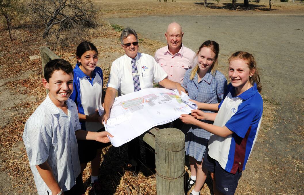 Josiah Mock, Oriana Panozzo, Gary Wallace, Richard Nagorcka, Abbey Hawker and Sarah Barber with plans for the new senior school site at Holy Trinity Lutheran College in 2016.