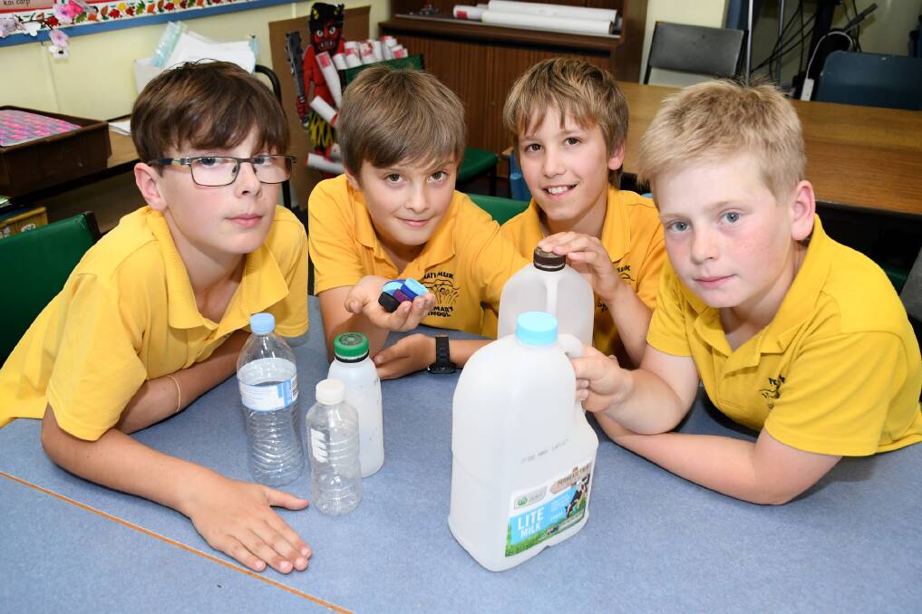 NEW PROJECT: Natimuk Primary School students Bailey Taylor, Jed Haustorfer, Ben Grey and Archie Sudholz with plastic items ready to be recycled. Picture: SAMANTHA CAMARRI