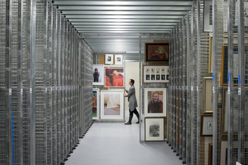 Horsham Regional Art Gallery's permanent collection is storage on wire racks in its storage room.