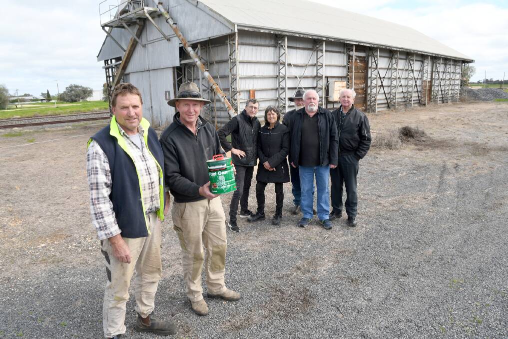 Peter Niewand, Michael Funcke, Dale Maggs, Corinne Heintze, Peter Haney, Don Orr, and Dale Petering at the site for the new Minyip Fuel Station. 