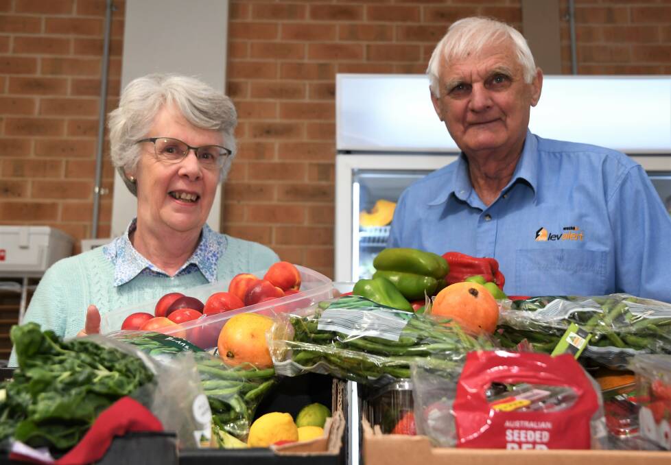 HELPING HAND: Horsham Christian Emergency Food Centre volunteers Mavis and Les Warrick with fresh produce donated to the centre. The centre has many clients with young children. Picture: JADE BATE